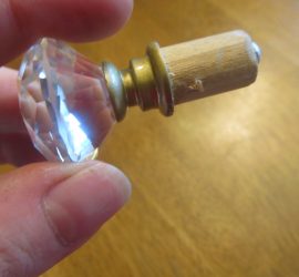 Make curtain rod finials out of kitchen knobs