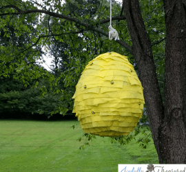 DIY Beehive pinata with newspaper mache and crepe paper. Easy diy teddy bear picnic party decoration #partydecor #picnic #birthday #party