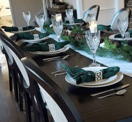 Make a neutral winter tatablescape with greenery from the yard and simple affordable supplies. Create easy decor that lasts beyond the holidays. #tablescape #neutral #farmhouse #christmasdecor #winterdecor