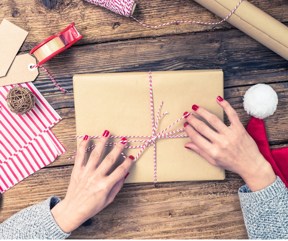 Custom photo calendar wrapped as a thoughtful gift with twine and seasonal decor