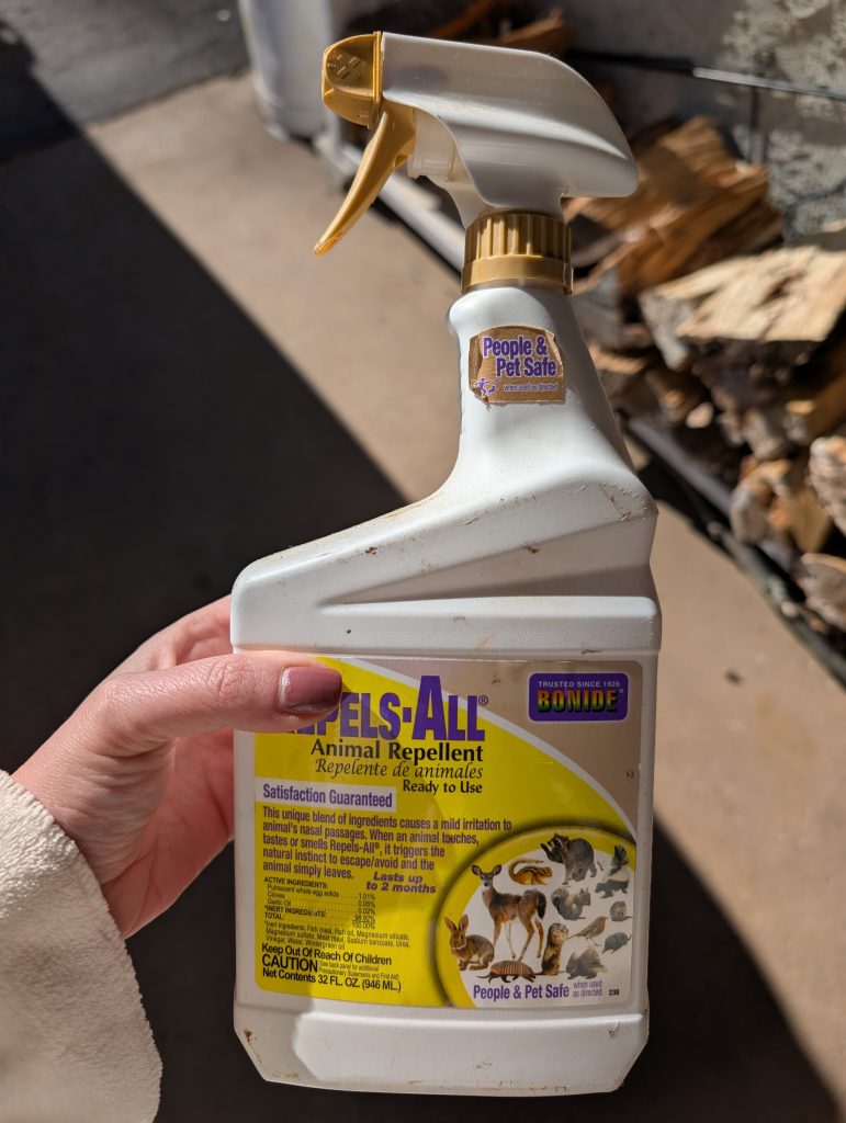 Repels All animal repellent spray used in a home garden to help deter deer from browsing plants