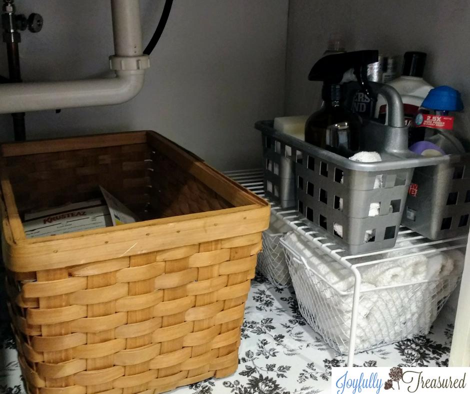 Organize under the kitchen sink with simple supplies you can find at the dollar store