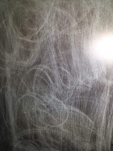 Sanding laminate furniture before primer coat