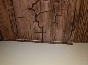 Cut excess contact paper. painting over laminate furniture makeover