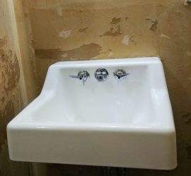 painting the bathroom sink, easy DIY bathroom makeover using Rustoleum tub and tile refinishing kit. makeover this dated 1960's powder room to farmhouse style for just $100! #budgetdecor #homediy #bathroomdiy #budgetreno #beforeandafter