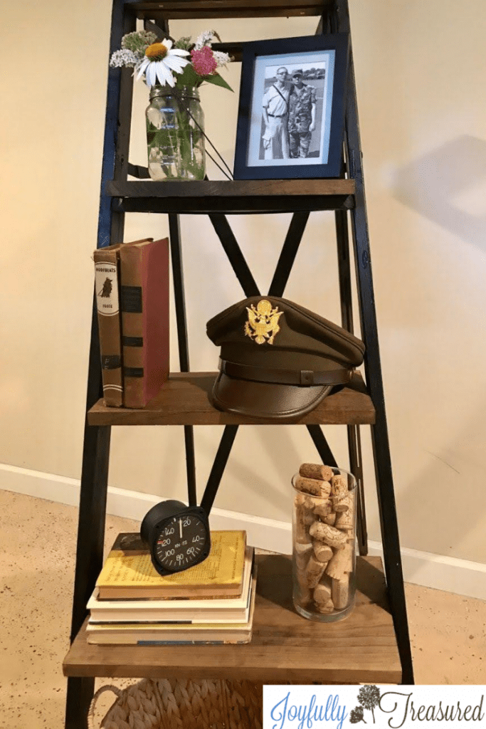 DIY old wooden ladder shelf upcycle. If you have an old ladder laying around the house, check out this quick and easy rustic industrial furniture idea! #furnitureflip #diyfurniture #industrial #farmhouseindustrial #rustic #upcycling