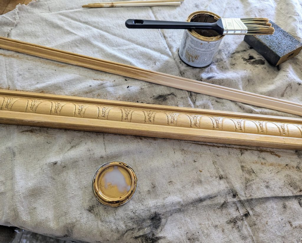 diy poster hanger with decorative trim