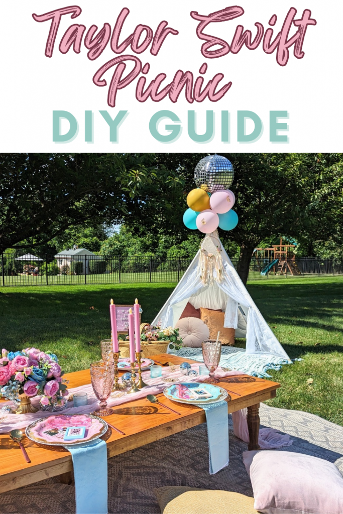 Colorful Taylor Swift-inspired picnic setup featuring a pink and blue tablescape, a cozy teepee, and sparkling gold and silver disco balloons—styled for a dreamy, eras-themed outdoor celebration with whimsical flair.