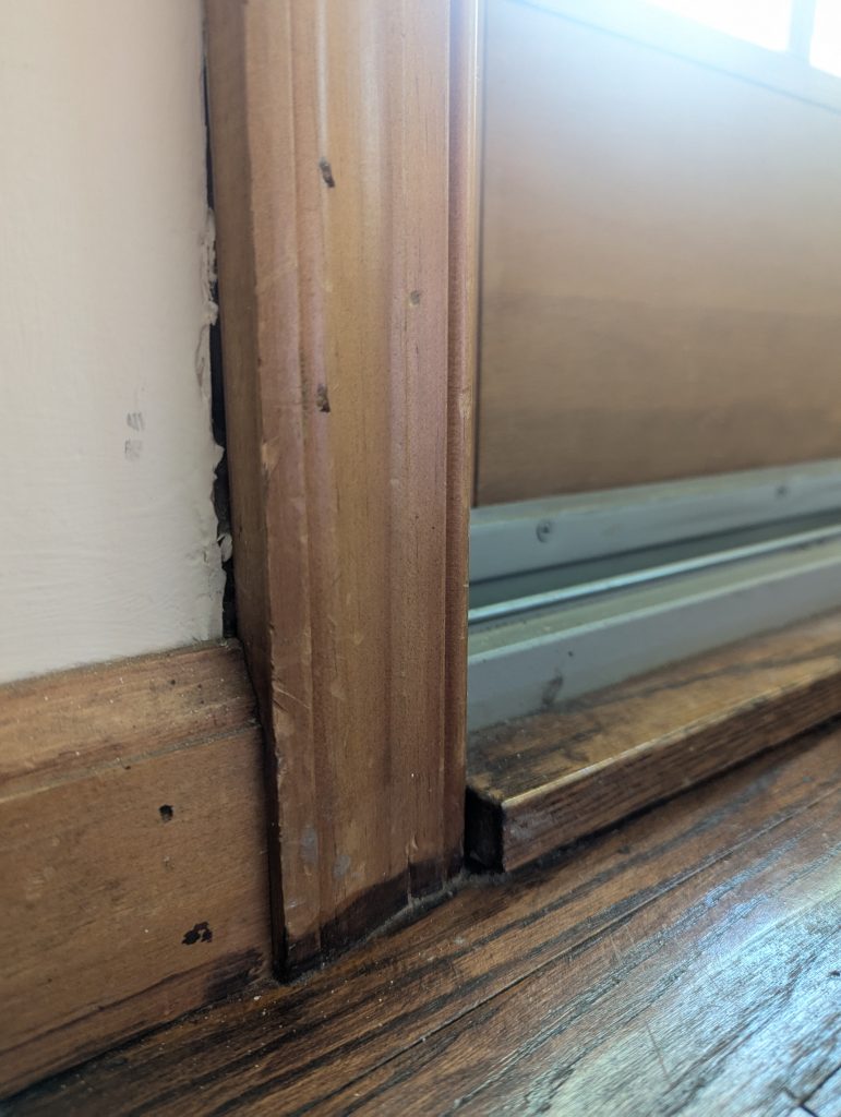 keep the house warm in winter by sealing cracks and holes like these around exterior doors and windows